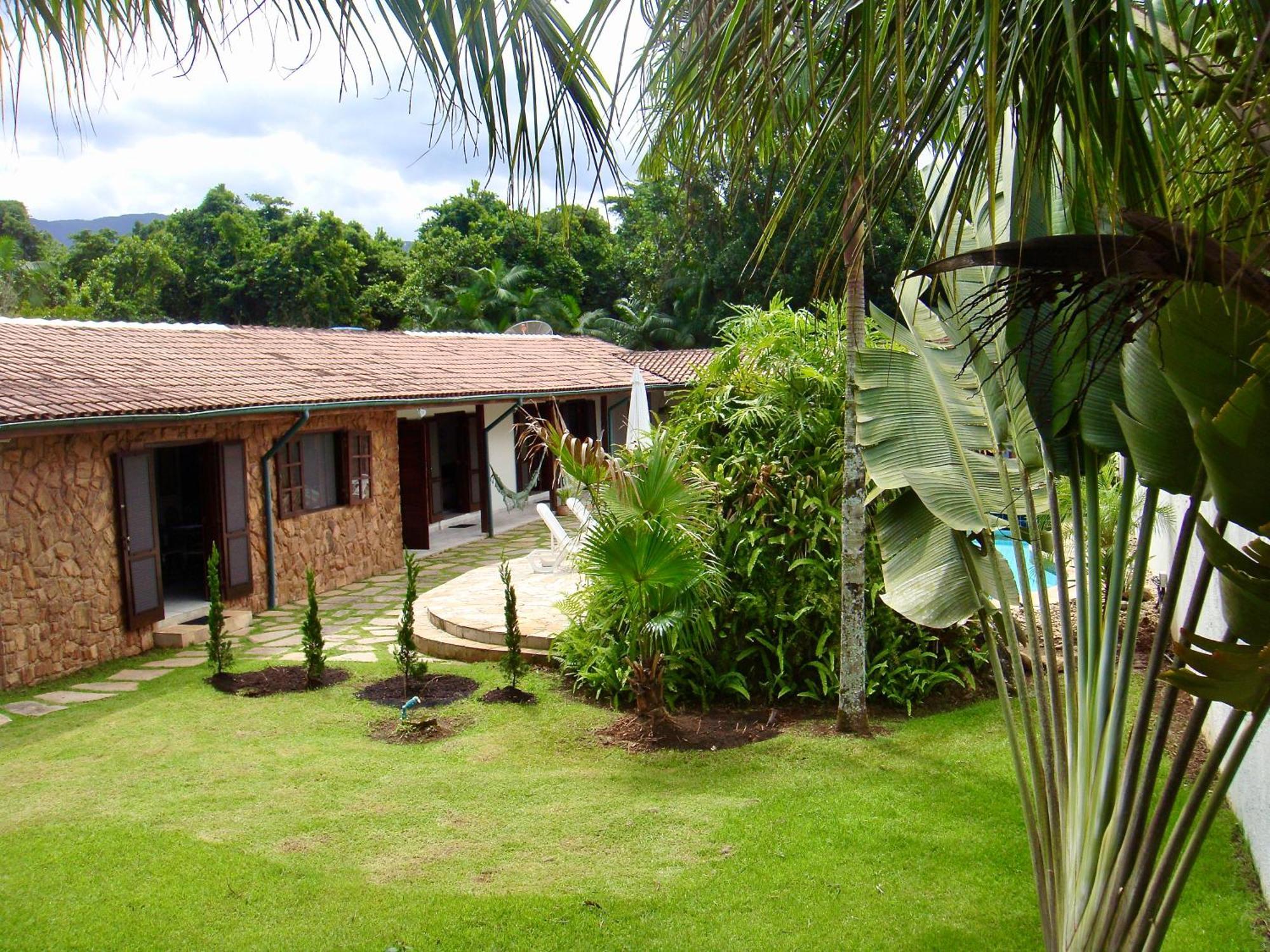 Holiday home Casa Enorme: Riverside Retreat With Forest Views And High-speed Internet Bertioga