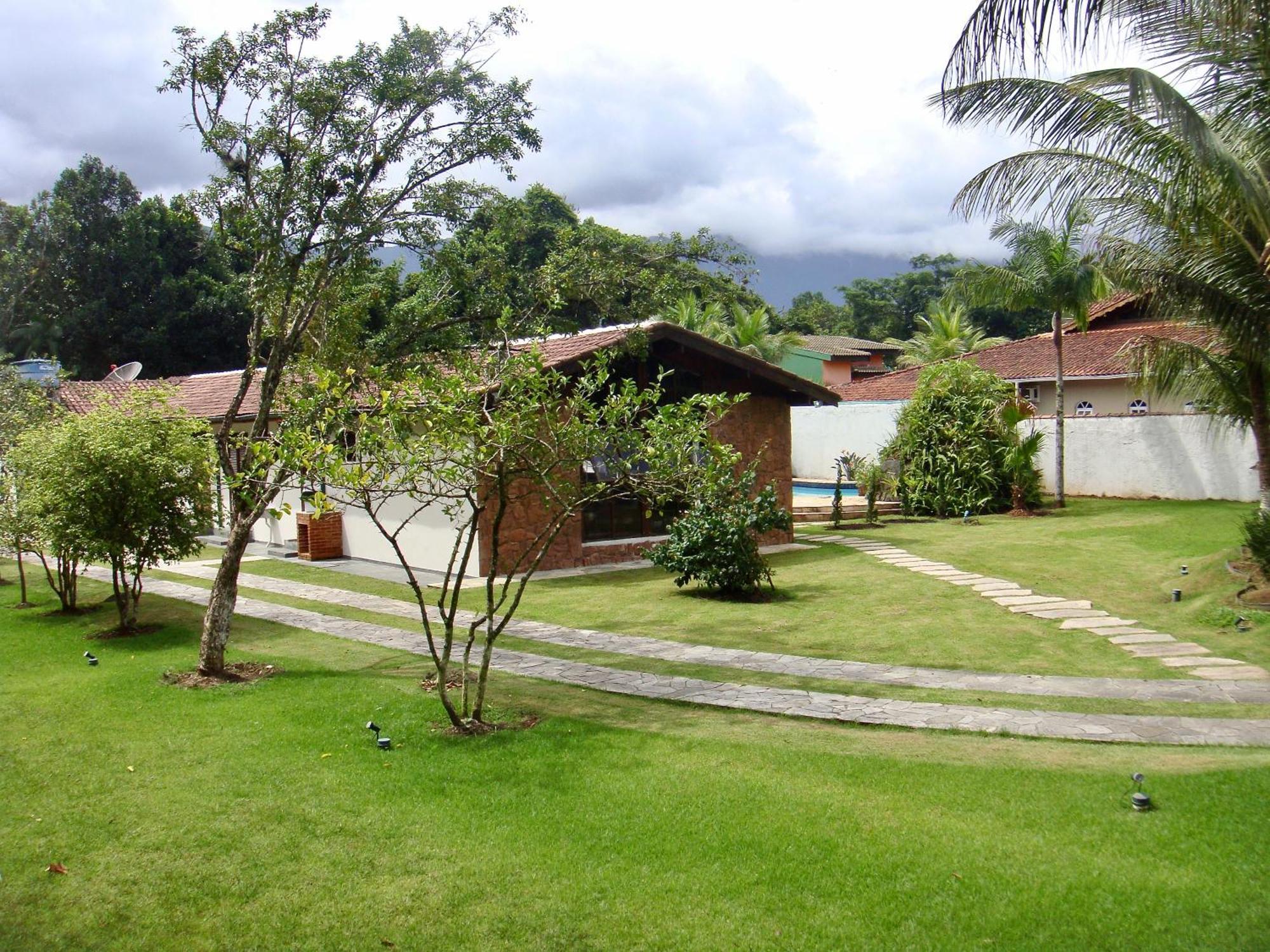 Casa Enorme: Riverside Retreat With Forest Views And High-speed Internet Holiday home Bertioga