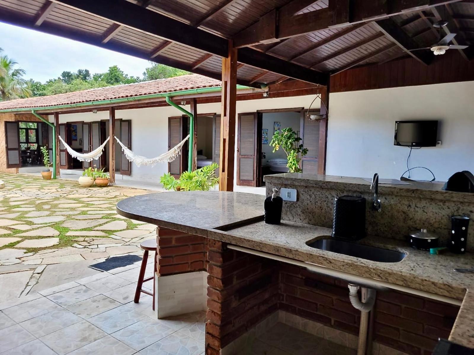Casa Enorme: Riverside Retreat With Forest Views And High-speed Internet Holiday home Bertioga
