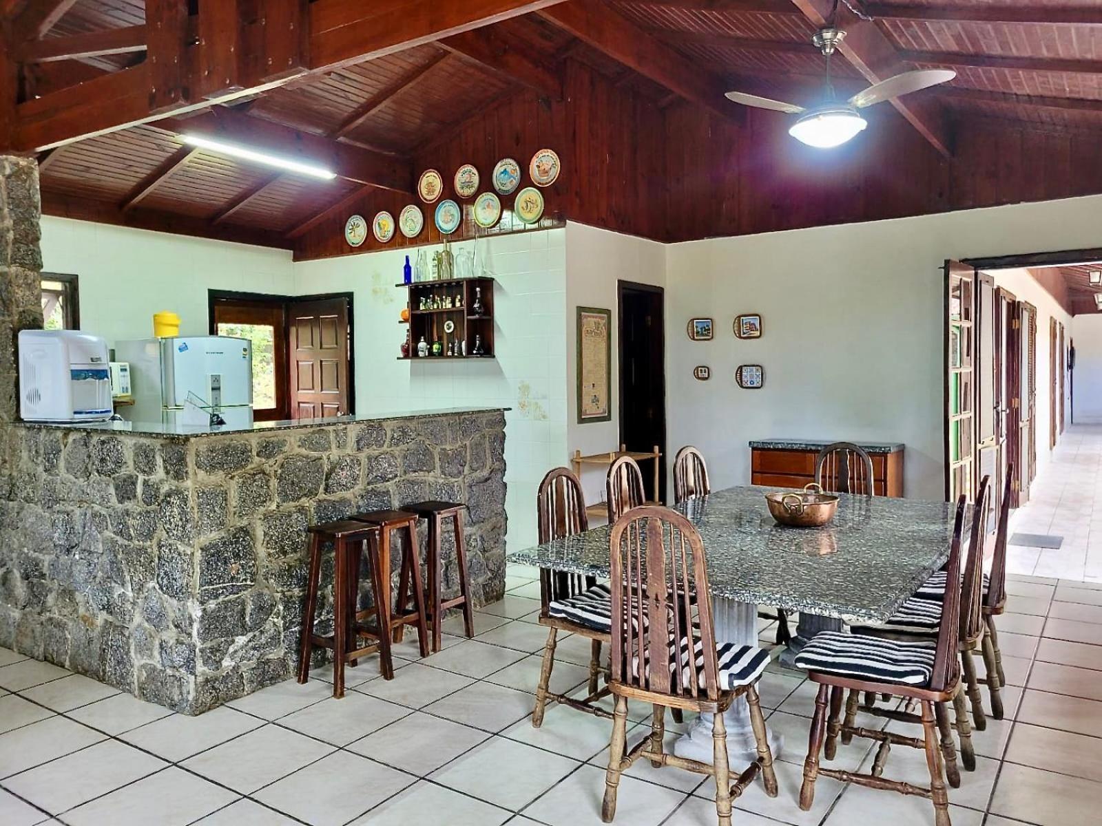 Holiday home Casa Enorme: Riverside Retreat With Forest Views And High-speed Internet Bertioga