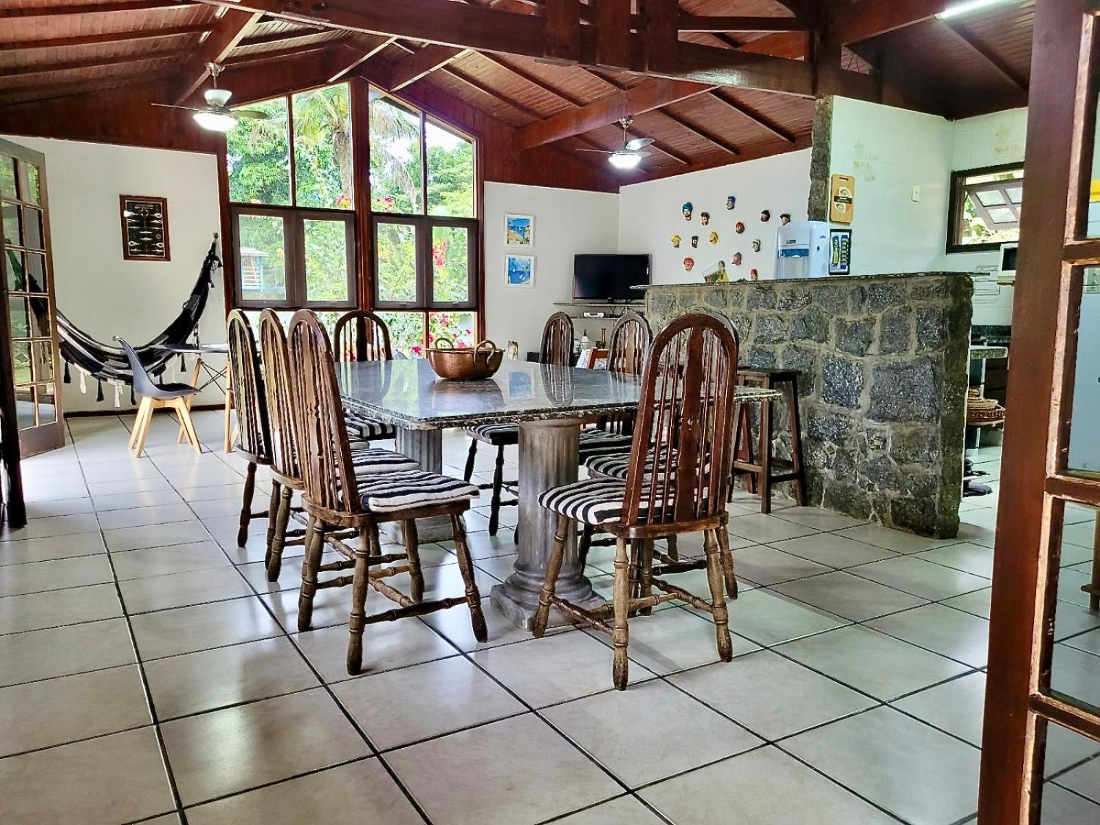 Holiday home Casa Enorme: Riverside Retreat With Forest Views And High-speed Internet Bertioga